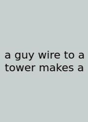A Guy Wire To A Tower Makes A
